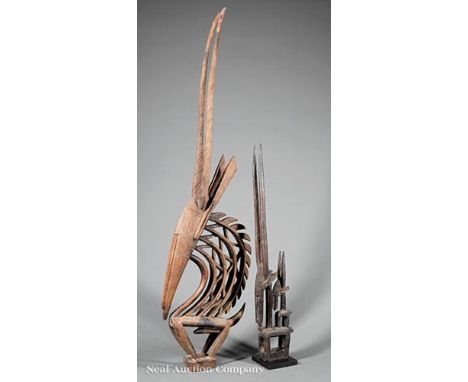 Two African Carved Wood Chi Wara Headdresses, Bamana Peoples, Mali, h. 63 1/4 in. and 39 in. Provenance: Memphis Brooks Museu