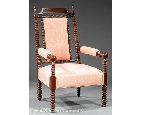 Antique American Bobbin Turned Walnut Armchair, mid-19th c., Philadelphia, shaped crest, finialed turned stiles, padded back 