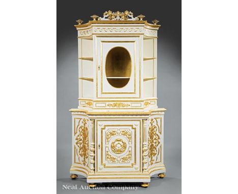 Continental Carved and Gilt Decorated Creme Peinte Cabinet, foliate crest, upper case with incurvate sides fitted with shelve