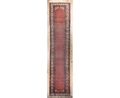 Antique Persian Runner, red ground with overall paisley pattern and white ground border, 16 ft. 4 in. x 3 ft. 9 in     