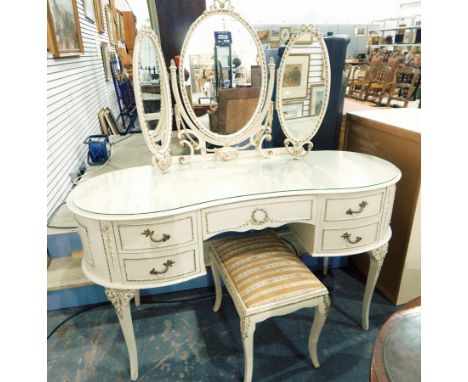 20th century white and gilt French-style kidney-shaped painted dressing table with three-fold mirror, arrangement of five dra