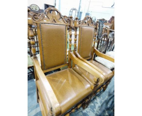Pair of 20th century oak carver chairs with arched back top rail, bobbin turned uprights, faux-leather seats, on square and b