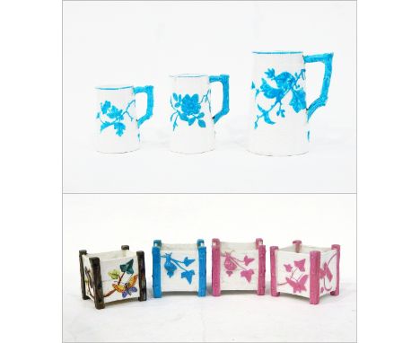 Four Victorian Royal Worcester vases, each of square form, naturalistically moulded as wooden planters with trailing ivy, a b