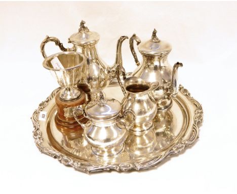 Four piece tea and coffee set of baluster form on a pedestal base, having scroll finials to lids, scroll handles and spouts w