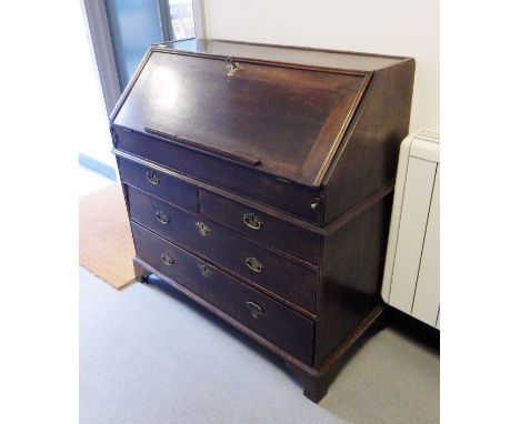 18th century oak bureau, the fall to reveal fitted interior, two short and two long graduated drawer, on shaped bracket feet,