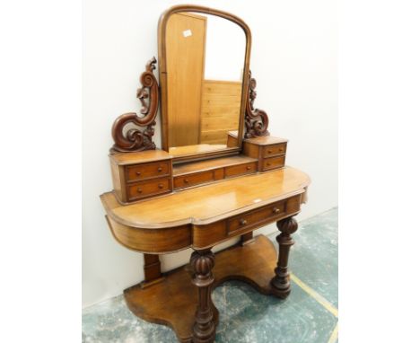Victorian mahogany demi-lune duchess-style dressing table with arched top, swing mirror, three drawers below, on scroll suppo