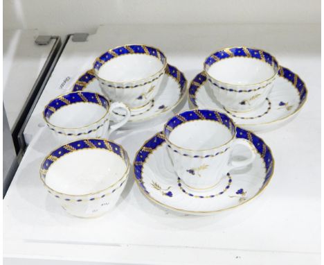 Set of three 18th century Worcester tea bowls and saucers and a pair of coffee cups ensuite, each of wrythen design with blue