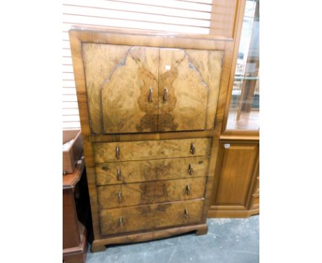 Art Deco walnut veneered cabinet over four graduated drawers, on shaped bracket feet, 79cm wide  