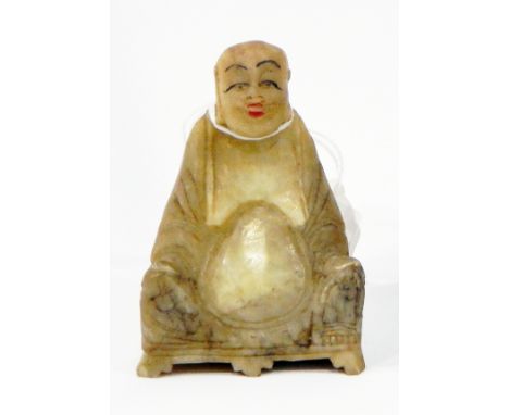 An Oriental carved jade seated figure of a sage, 8cm high and another oriental resin figure (2)