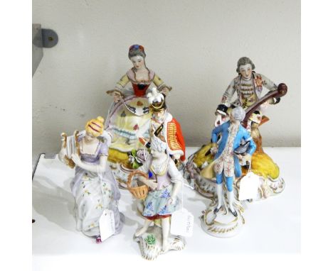 Pair of continental porcelain figures, one depicting a gentleman playing a cello, the other a lady with music, on floral encr