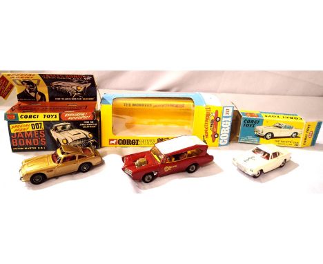 Three Corgi Toys TV related vehicles; 261 James Bond - model not working, reproduction box etc, 277 Monkee Bobbie  - model fa