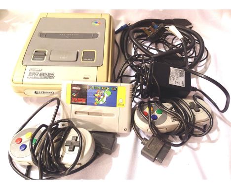 Super Nintendo console with x2 control pads, leads etc and Super Mario World game. P&amp;P Group 2 (£18+VAT for the first lot