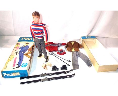 Sindys boyfriend Paul, by Pedigree Toys, complete with stand, dog on lead, skis and poles, skates, clothing. All in good - ve