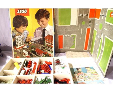 Lego 810 vintage set, with play board, catalogue, x10 vehicles, cycle scooter, sidecar, trees and signs, lights, petrol pumps