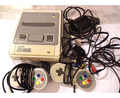 Super Nintendo console with x2 control pads, leads, Transformer etc. P&amp;P Group 1 (£14+VAT for the first lot and £1+VAT fo