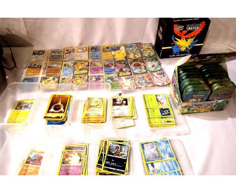 Large collection of Pokémon items to include cards and tins, all mixed age. P&amp;P Group 2 (£18+VAT for the first lot and £3