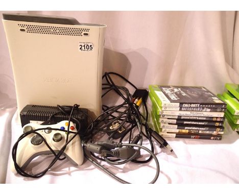 XBox 360 console, control pad and cables, eight games and a further six games (lacking instructions). P&amp;P Group 3 (£25+VA