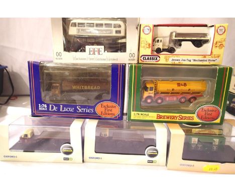 Seven OO scale diecast vehicles; bus, tankers, arctic, Scammell scarab etc. Mostly excellent condition, boxes with storage we