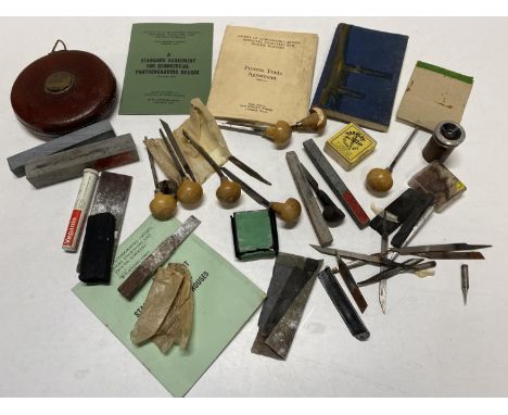 A selection of vintage tools including a tape measure and EC Lyons engravers 