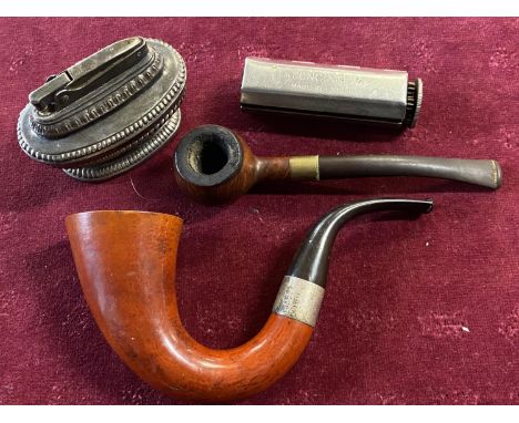 A selection of smoking ephemera including a Ronson Queen Anne table lighter one Hardcastle special selection pipe and one pip