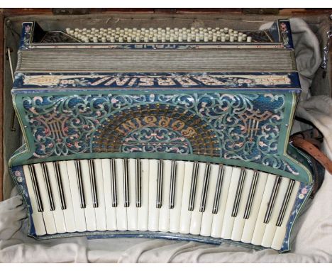 An early 20th century Borsini 120 key piano accordion, in oak and ply case