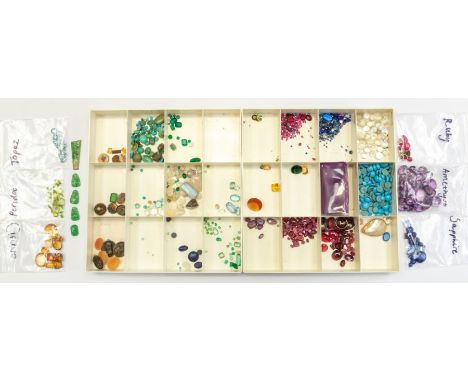 A quantity of loose gemstones to include natural and synthetic sapphires, rubies and emeralds, &nbsp;along with garnets, moon