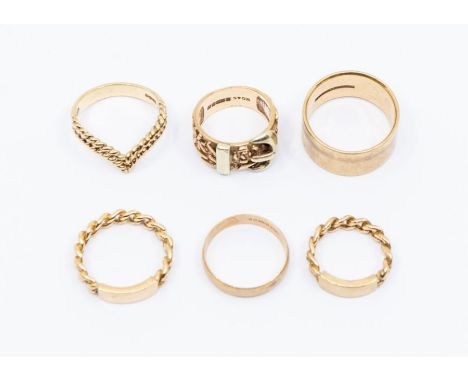 A collection of six 9ct gold rings, to include a buckle ring, size J, two rope twist rings, sizes F and M, a roped wishbone r