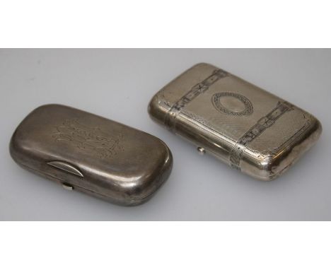 A late 19th century Russian silver, niello and engine turned cushion shaped oblong cigarette box with banded decoration c 188