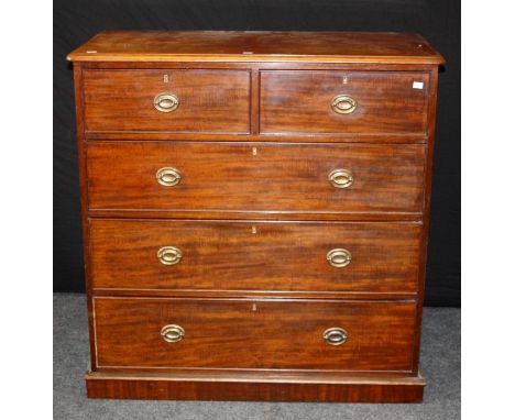 An early 19th century mahogany chest, the rectangular top with moulded edge over two short and three long drawers with brass 