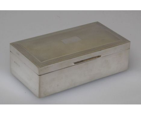 John Rose, a silver cigarette box, the rectangular engine turned cover with vacant cartouche over plain body. 16.5cm wide, Bi