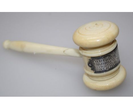 A late 19th century turned ivory gavel with white metal presentation plaque. 16cm