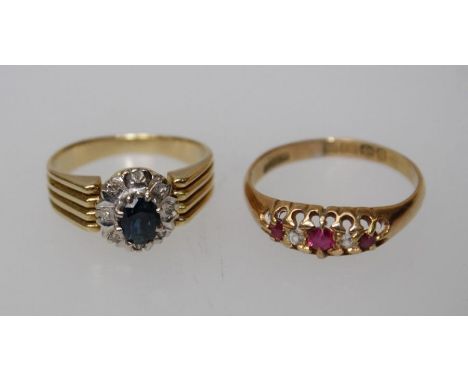 A sapphire cluster ring and an 18ct ruby and diamond ring (central stone possibly replaced)