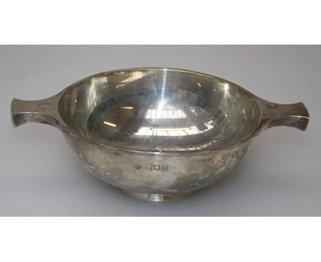 A silver Quach of typical form with panel handles, London 1909, Goldsmith and silversmith, width 17cm