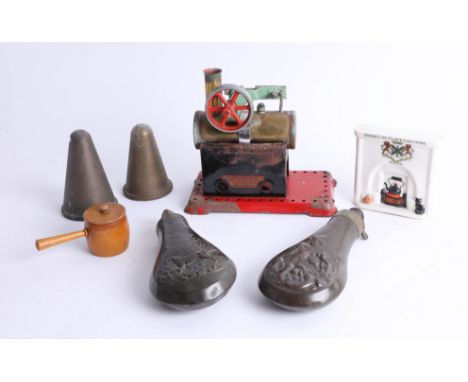 Mixed collection including powder horns, brass lids, incomplete Mamod steam engine and a crested ware fireplace 'There's no p
