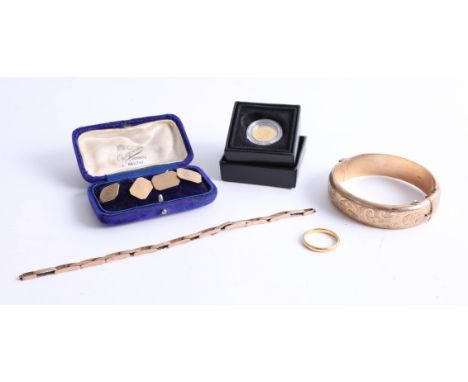 A 9ct bangle together with 9ct cuff links, 9ct watch chain (38.5g), 22ct wedding band 3.8 g, and miniature QEII gold half cro