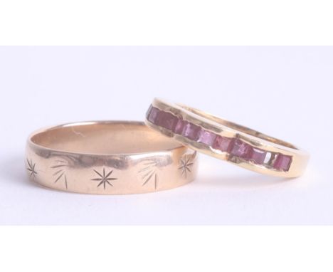 An 18ct yellow gold ruby ring and a 9ct gold band ring approx. 2.5g (2).