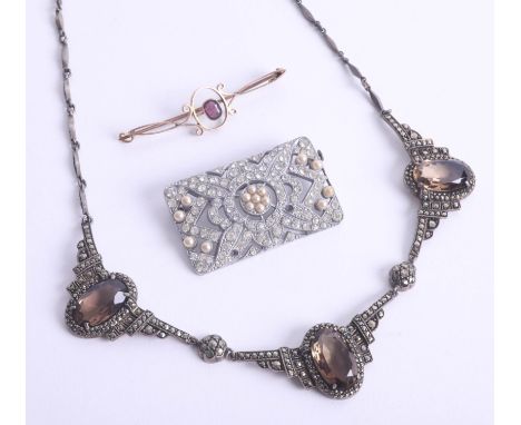 A 9ct gold and amethyst antique brooch 2g together with a costume necklace and brooch.