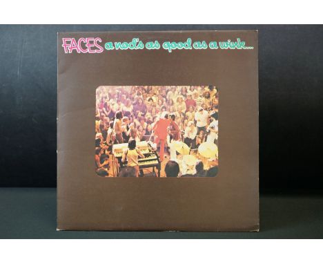Vinyl - Faces A Nod's As Good As A Wink (K 56006).  Sleeve Vg+  Poster intact .  Vinyl Vg+ with initials written to side one.