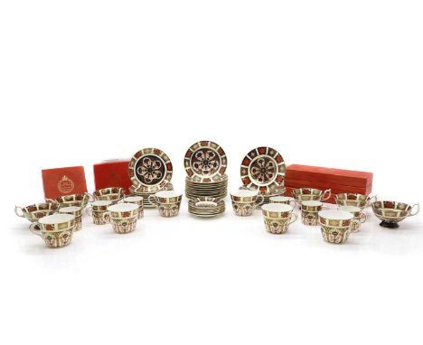 A part Royal Crown Derby Imari pattern porcelain tea and coffee service comprising six breakfast cups, 13cm wide, ten breakfa