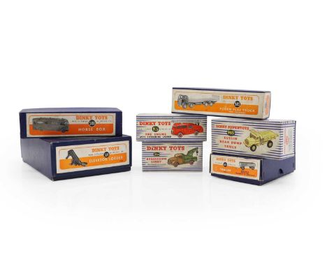 A collection of Dinky die cast toys comprising a 25x Breakdown Lorry, 965 Euclid Rear Dump Truck, 955 Fire Engine, 503 Foden 