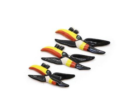 A set of three Carltonware graduated flying Guinness Toucan wall plaques, each modelled as a toucan with two pints of Guinnes