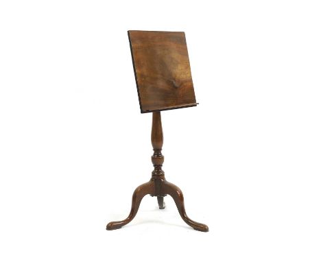 A George III mahogany reading stand the rectangular tilt top, on a telescopic column, to a tripod base, 45.5cm wide42cm deep1