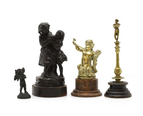 A group of bronze and gilt metal figures  20th century, comprising a young boy with a fish8cm higha gilt metal model of Nelso