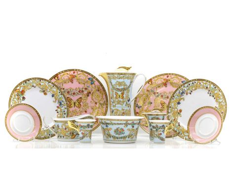 A Versace Rosenthal porcelain dinner service: comprising fourteen serving plates, 31cm diameter, twelve dinner plates, 27cm d