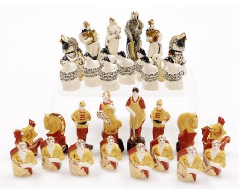 A late Russian chess set, after the original by Natalia Danko, each figure with a black signature to underside, each approx 1