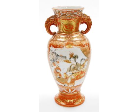 A late 19thC Kutani style Chinese vase, with scroll handles and painted body depicting flying birds and flowers, on a gilt an