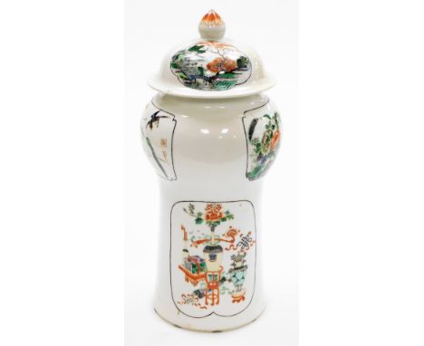 A Chinese porcelain famille verte vase and cover, with domed lid, bulbous neck and taper body, the reserves painted with a fi