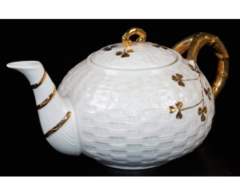 A late green marked Belleek large teapot and cover, of moulded three strand and shamrock design with flowers and handle picke