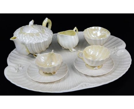 A rare Belleek complete cabaret set with tray, teapot and cover, creamer, sugar and two teacups and saucers, all in the Neptu