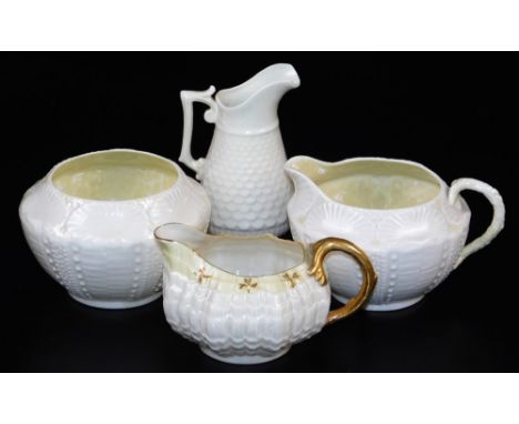 A group of first green mark Belleek wares, comprising of Tridacna creamer with yellow band and gilt shamrocks, new shell suga